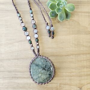 Prehnite crystal pendant necklace wrapped in matte brown coloured waxed cord